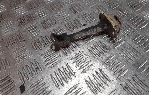 Nissan Almera Tino Front door check strap stopper