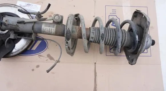 Peugeot Expert Front shock absorber with coil spring SKO71600