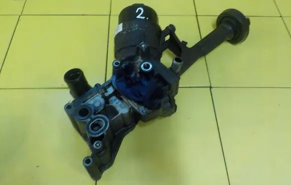 Opel Combo D Oil filter mounting bracket WLEW 4SP62