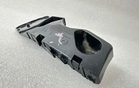 Mazda 3 III Front bumper mounting bracket D10J500U