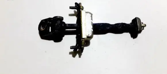 Front door check strap stopper