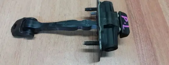 Front door check strap stopper