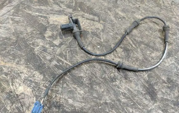 Infiniti G35 ABS brake wheel speed sensor 49385630