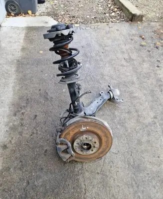 Front wheel hub spindle knuckle