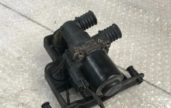Coolant heater control valve