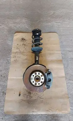 Front wheel hub spindle knuckle