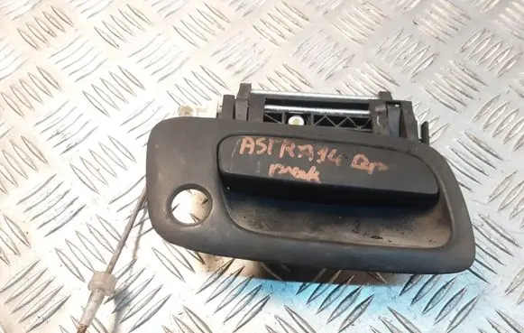Opel Astra G Front door exterior handle 712
