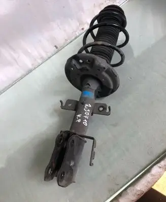 Nissan Juke II F16 Front shock absorber with coil spring 543031083r