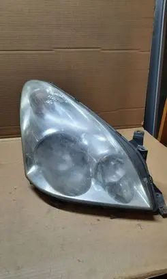 Toyota Corolla Verso E121 Headlight/headlamp 9073780