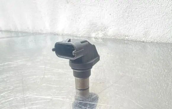 Opel Astra H Camshaft position sensor 002406 028J