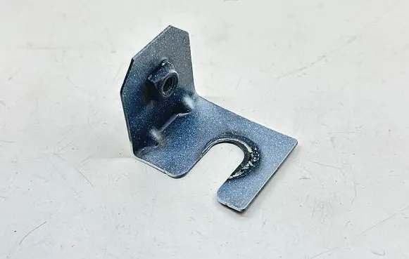 Jaguar XE Fender mounting bracket 