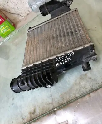 Opel Astra L Intercooler radiator P9675627980