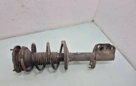 Toyota Avensis T250 Front shock absorber with coil spring 