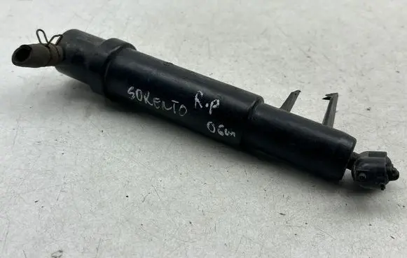 Headlight washer spray nozzle