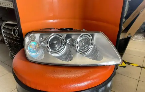 Volkswagen Touareg I Headlight/headlamp 7L6941016BK 89307861