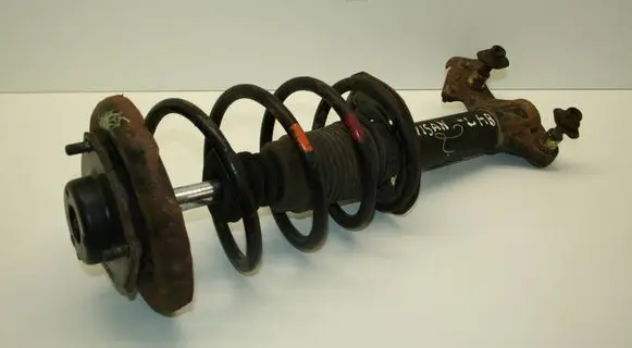 Nissan Primera Front shock absorber with coil spring