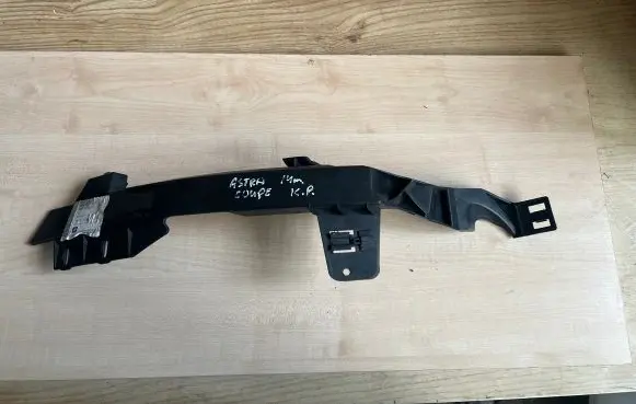 Opel Astra J Headlight/headlamp mounting bracket 13347146