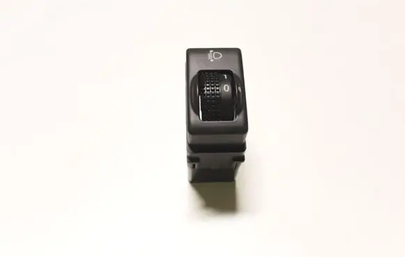 Headlight level height control switch