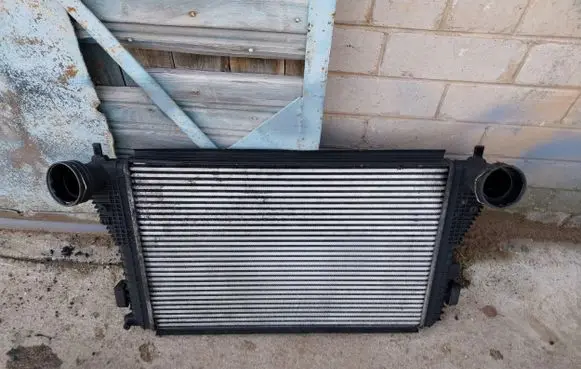 Volkswagen Golf V Intercooler radiator 1K0145803L