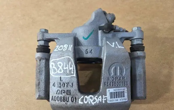 Opel Corsa F Front brake caliper 9843800180