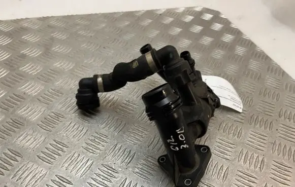 Thermostat/thermostat housing