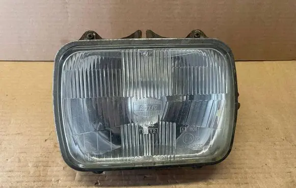 Mazda 323 Headlight/headlamp 104R7104R20 XR12