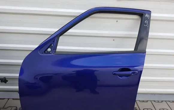 Nissan Juke I F15 Front door 