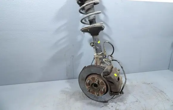 Hyundai Tucson JM Front shock absorber with coil spring