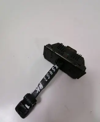 Front door check strap stopper