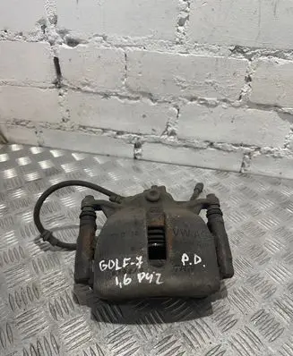 Volkswagen Golf VII Front brake caliper