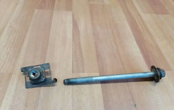 Front suspension camber bolt