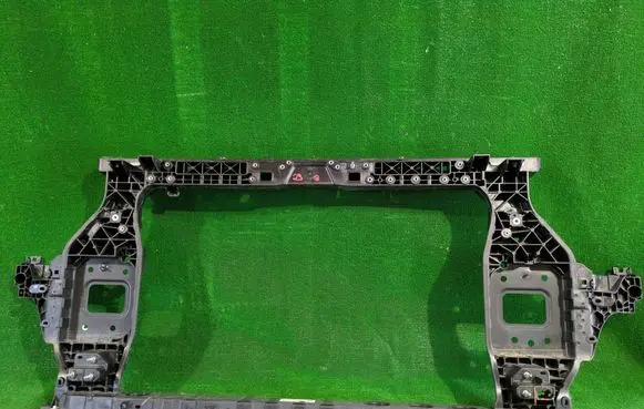 Radiator support slam panel