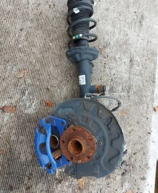 Volkswagen PASSAT B8 Front shock absorber with coil spring 3Q0413032A