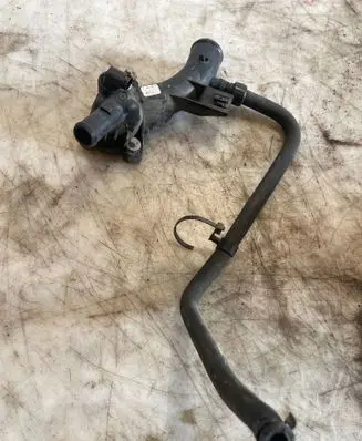 Thermostat/thermostat housing
