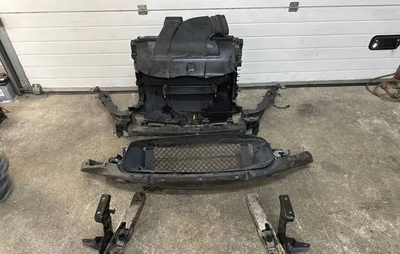 Radiator support slam panel