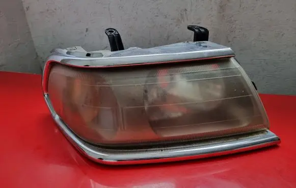 Mitsubishi Pajero Sport I Headlight/headlamp 10087415