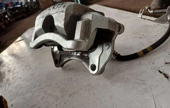 Hyundai Tucson IV NX4 Front brake caliper 58110D7700 SL01T1067
