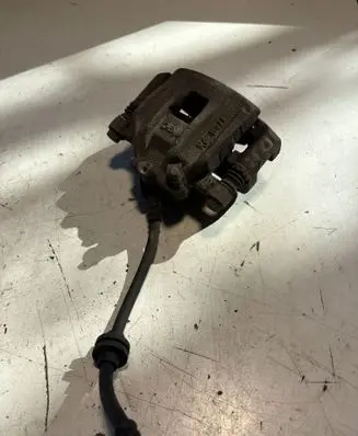 Dacia Spring Front brake caliper 
