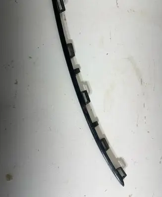 Rear bumper trim bar molding