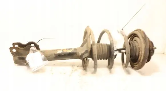 Nissan X-Trail T30 Front shock absorber with coil spring