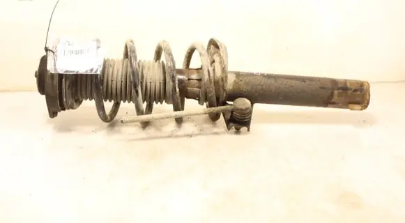 Volkswagen Caddy Front shock absorber with coil spring