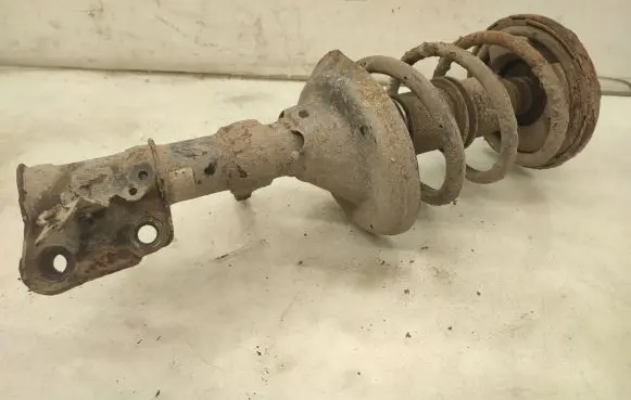 Honda FR-V Front shock absorber with coil spring