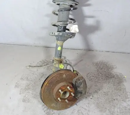 Subaru Legacy Front shock absorber with coil spring