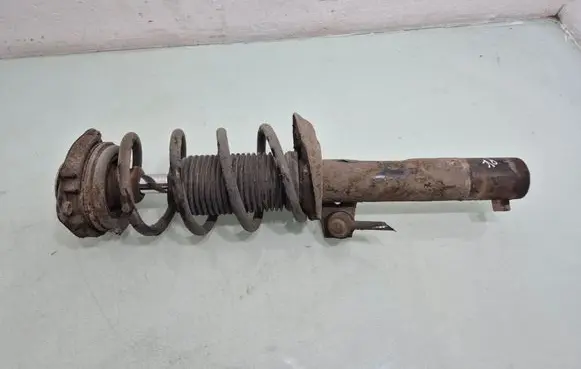 Volkswagen Golf V Front shock absorber with coil spring