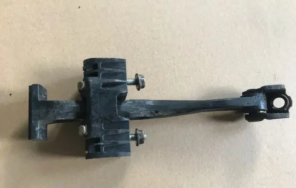 Opel Astra H Front door check strap stopper 13107175