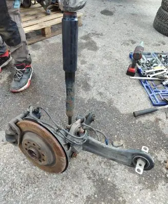 Rear wheel hub spindle/knuckle