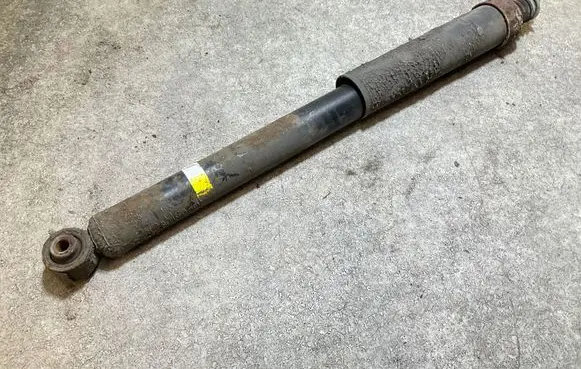 Nissan Leaf II (ZE1) Rear shock absorber/damper