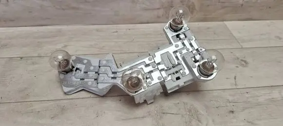Volvo V50 Tail light bulb cover holder