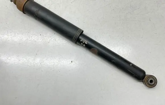 Nissan Pulsar Rear shock absorber/damper 562103ZL00 1604180 9105