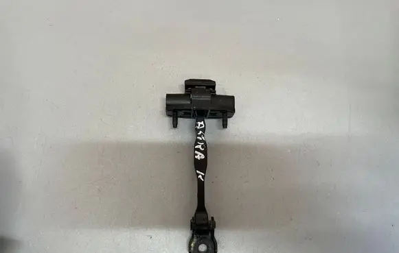 Front door check strap stopper